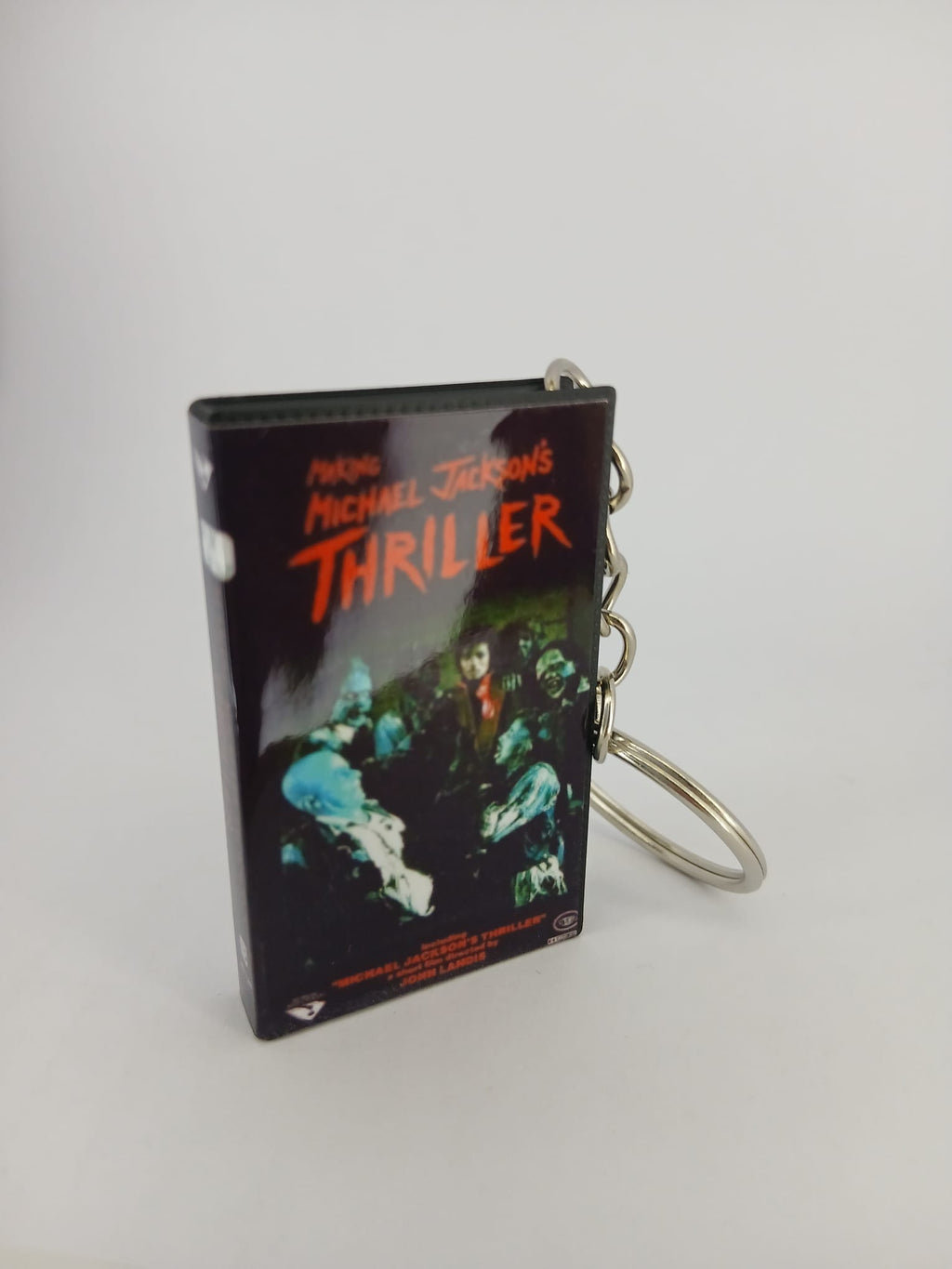Making Michael Jackson's Thriller VHS keyring — front and spine flat lay angled