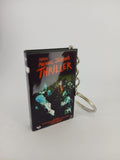 Making Michael Jackson's Thriller VHS keyring — front and spine flat lay angled