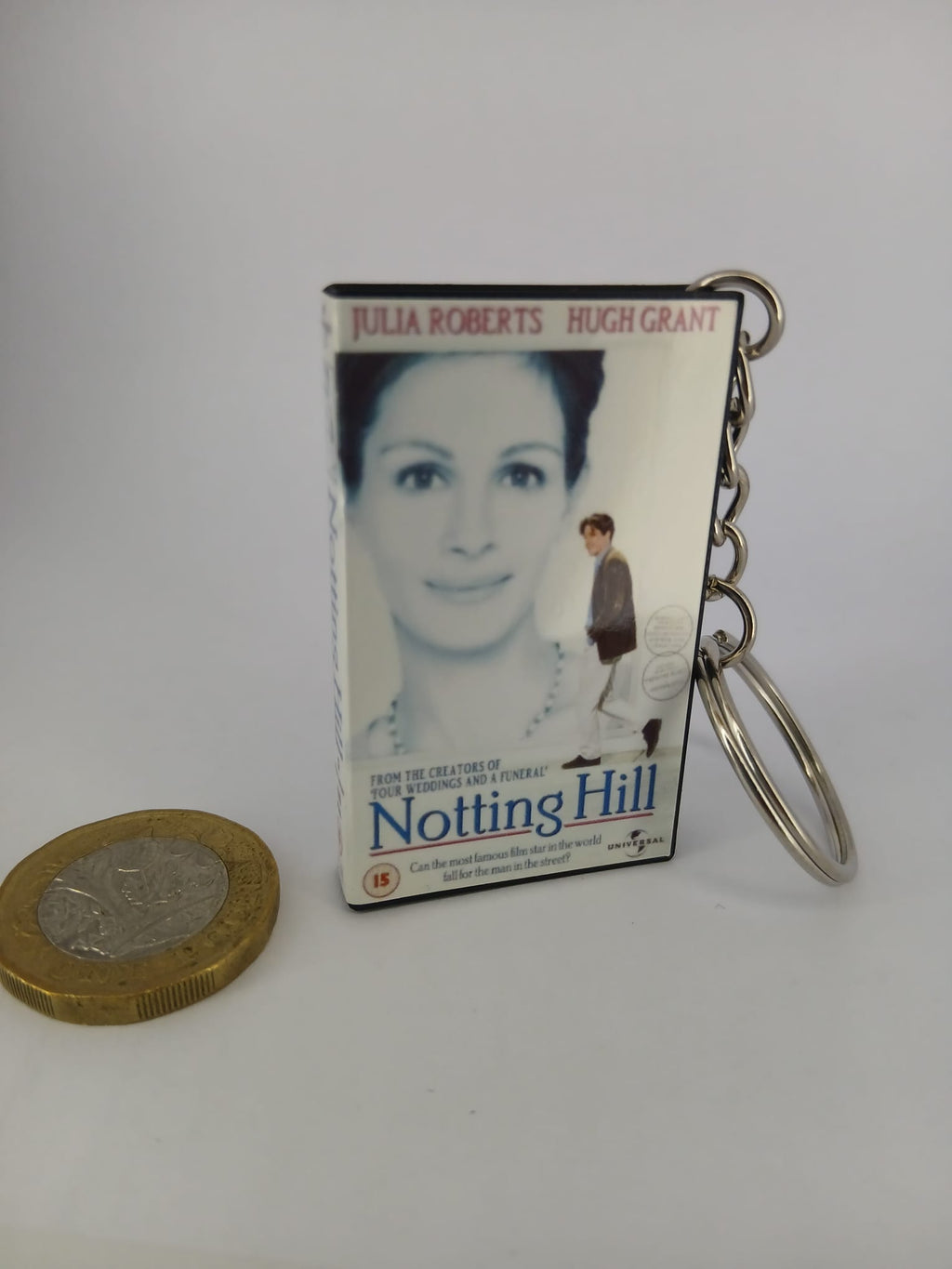 Notting Hill VHS keyring — back cover angled view standing