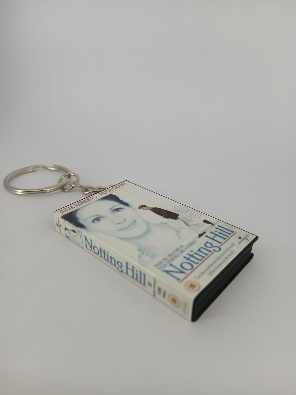 Notting Hill VHS keyring — back cover standing angled 2