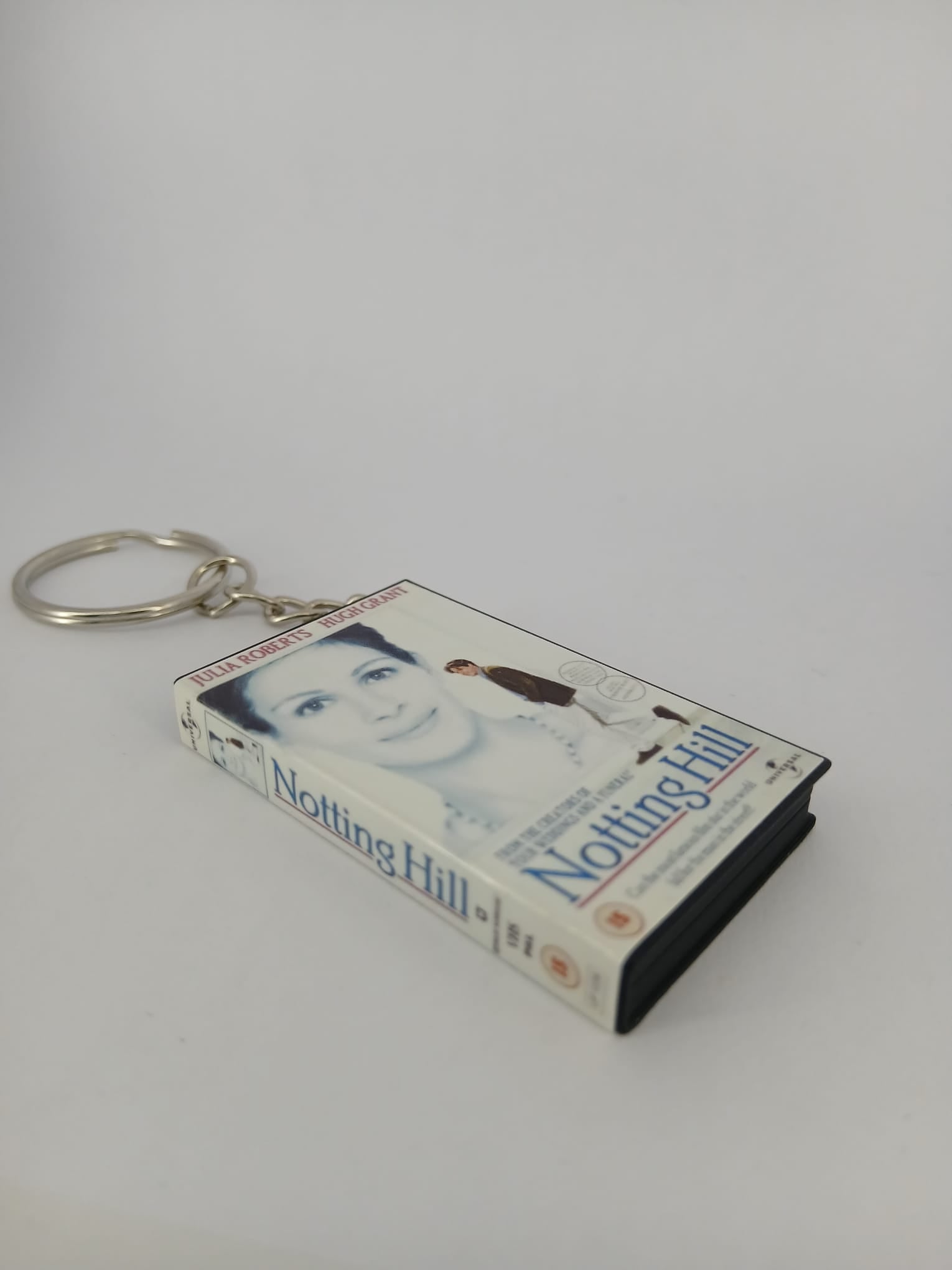 Notting Hill VHS keyring — back cover standing angled 2