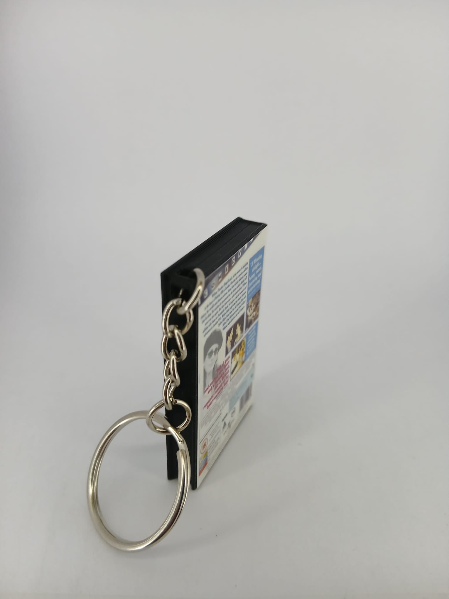 Notting Hill VHS keyring — spine and back angled view standing