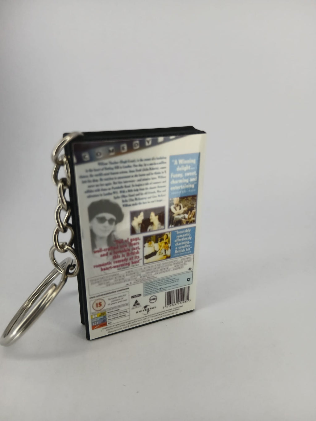 Notting Hill VHS keyring — spine view standing