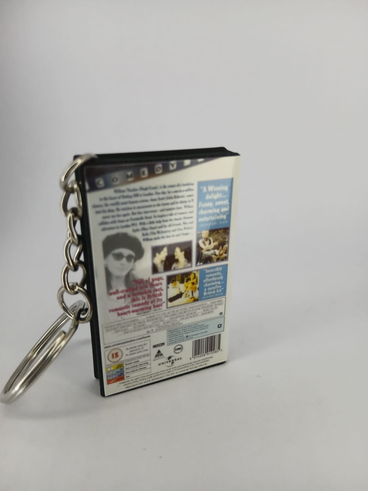 Notting Hill VHS keyring — spine view standing