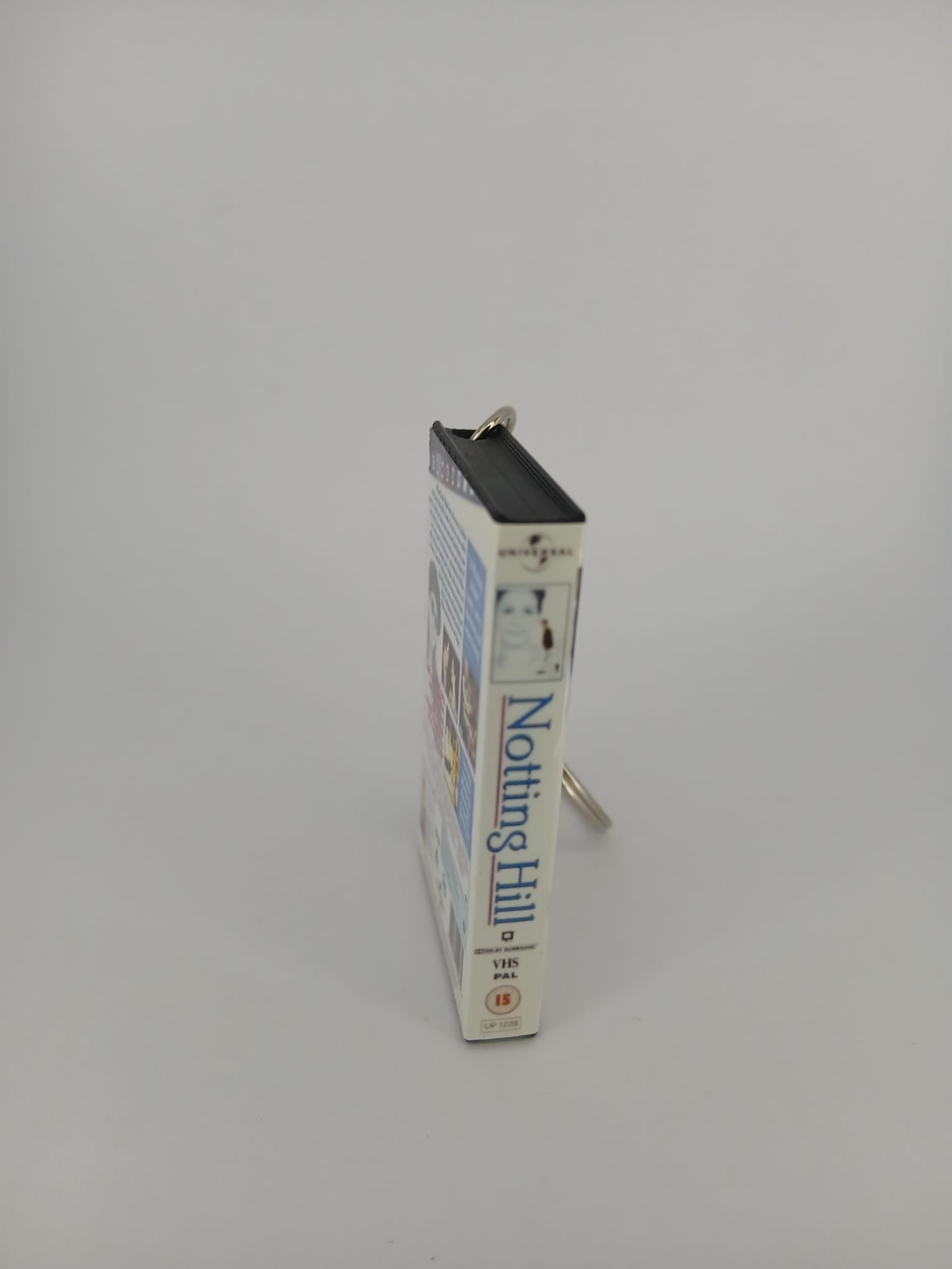 Notting Hill VHS keyring — front cover standing angled