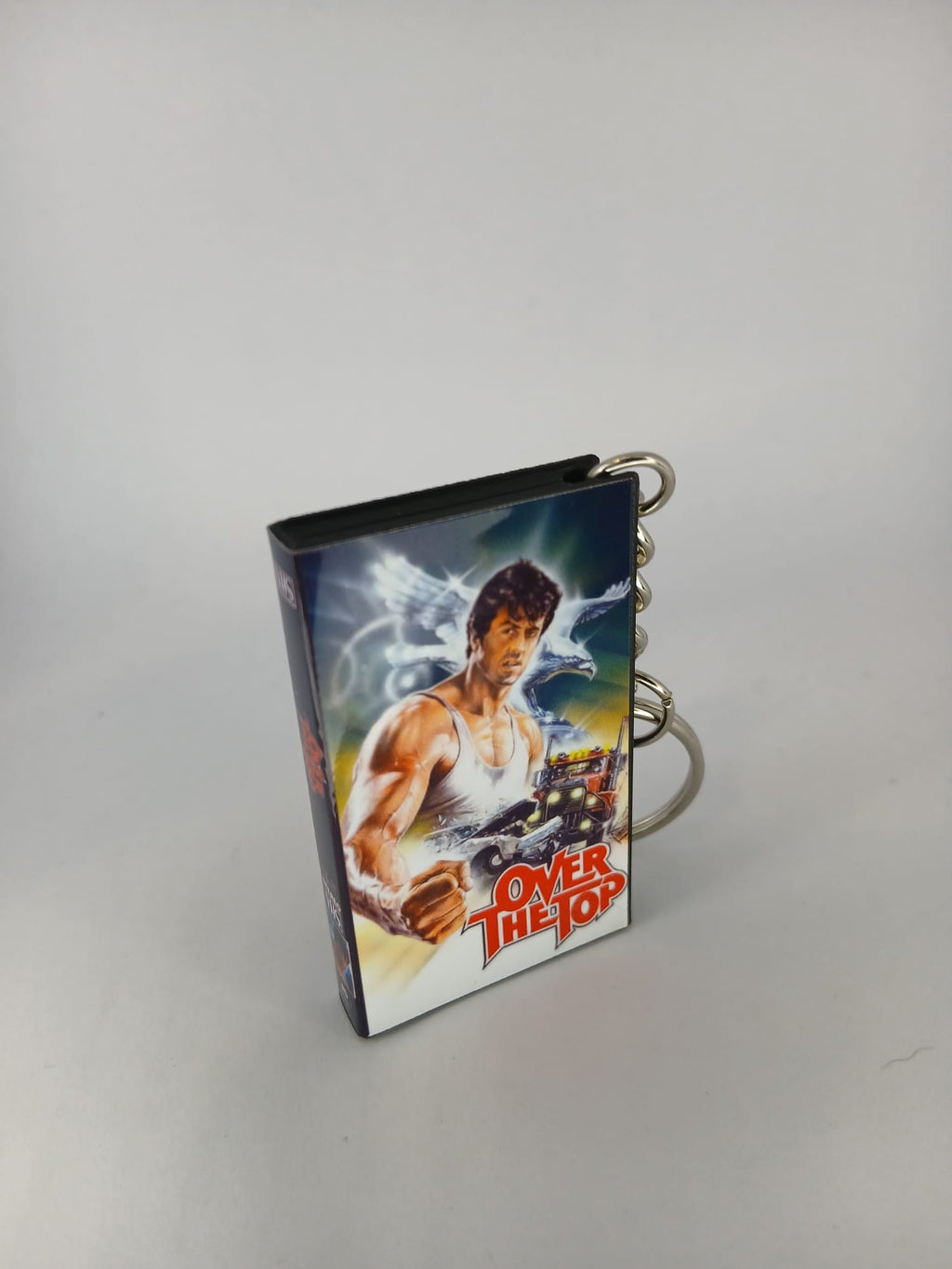 Over the Top VHS keyring — spine view