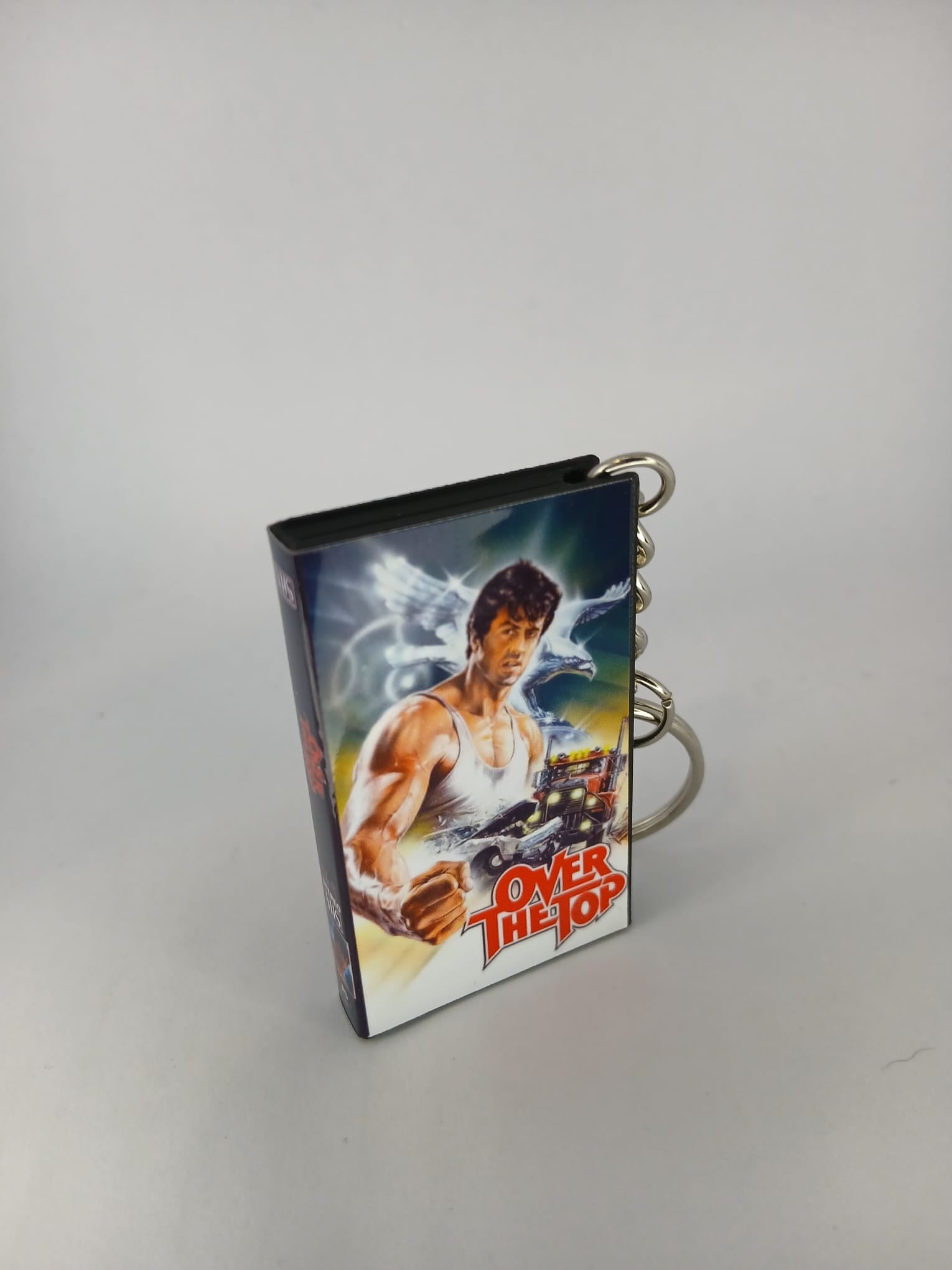 Over the Top VHS keyring — spine view