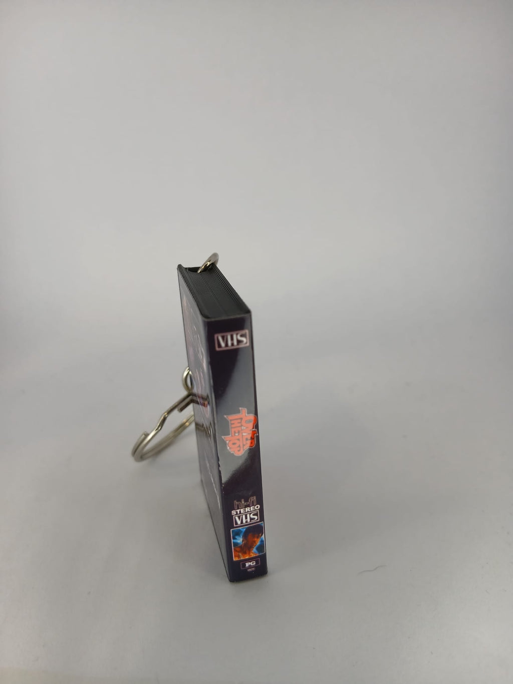 Over the Top VHS keyring — back cover detail