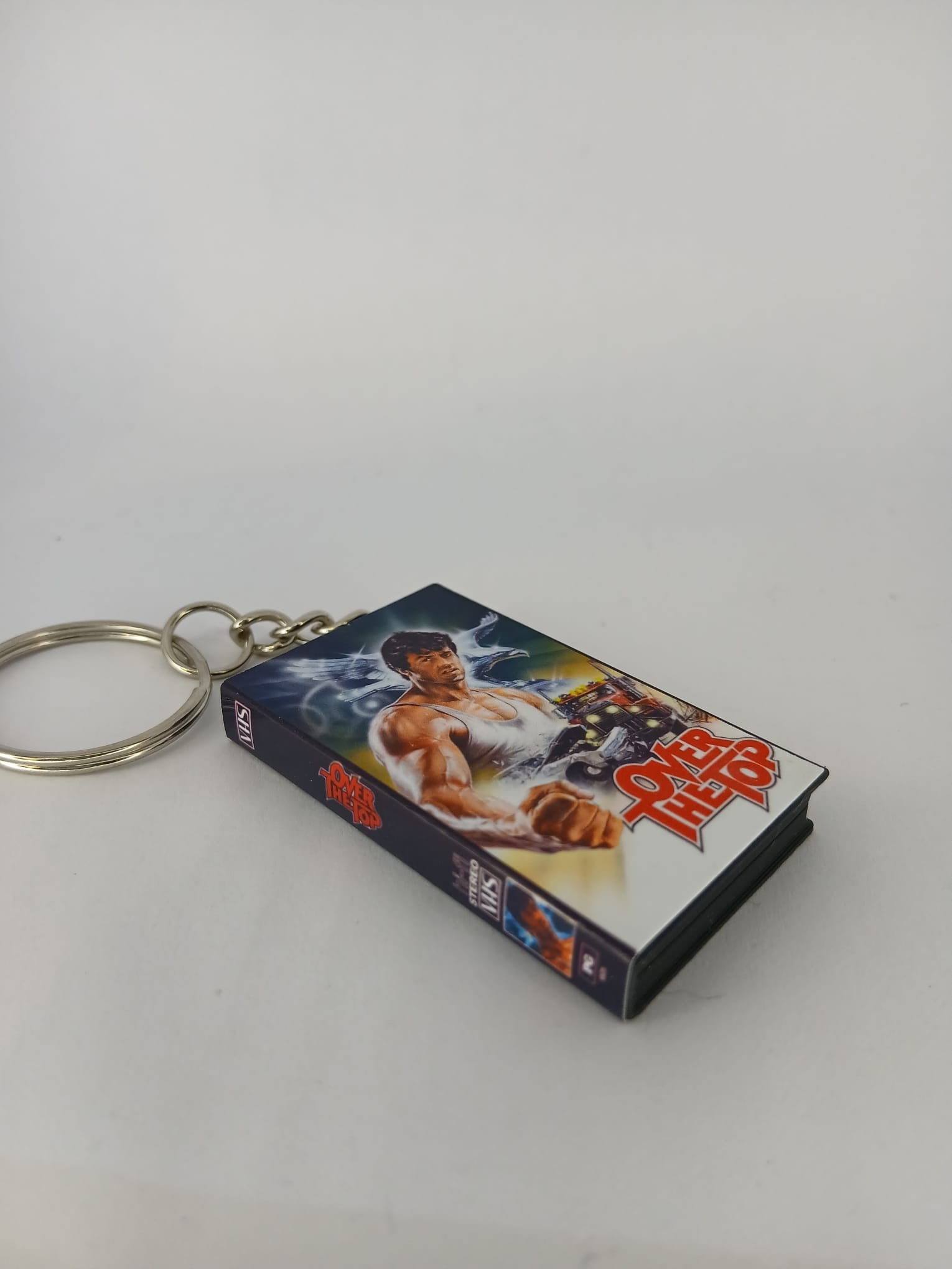 Over the Top VHS keyring — top down view