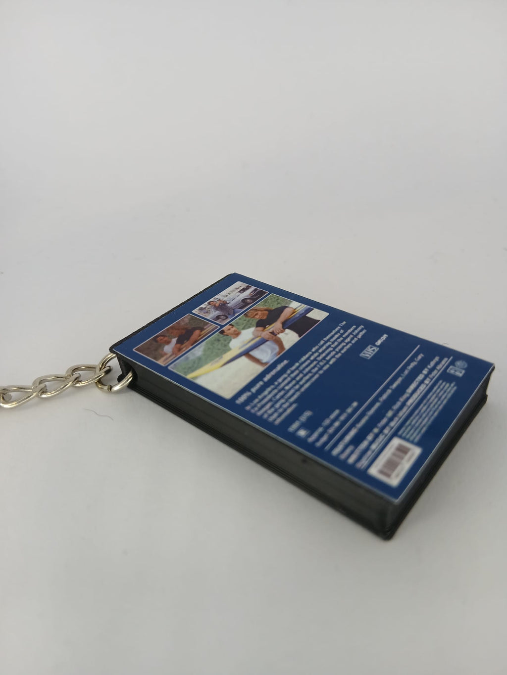 Point Break VHS keyring flat lay