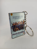 Police Academy VHS keyring — front cover standing angled 3