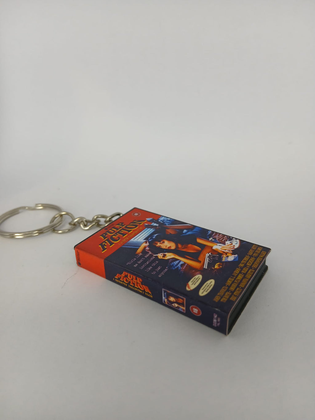 Pulp Fiction Mini VHS Keyring – flat lay side angle