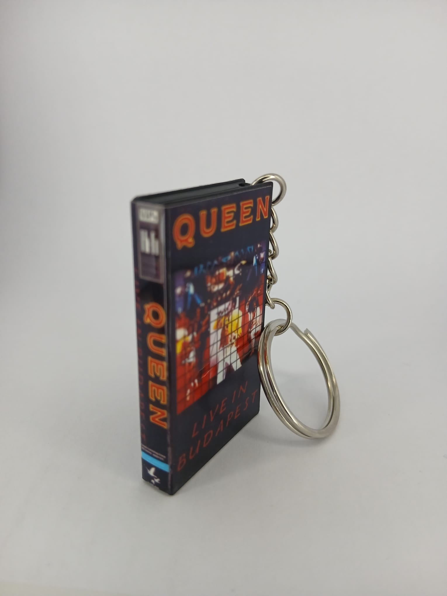 Queen Live in Budapest VHS keyring — front cover standing angled 2