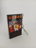 Queen Live in Budapest VHS keyring — front cover standing angled 3