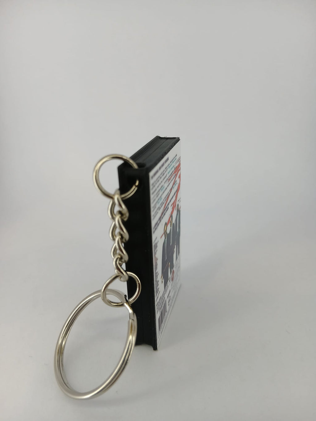 Reservoir Dogs VHS keyring — front and spine flat lay angled