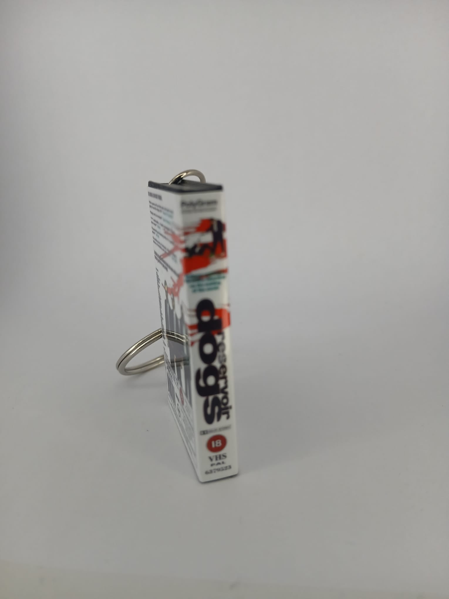 Reservoir Dogs VHS keyring — front cover standing angled