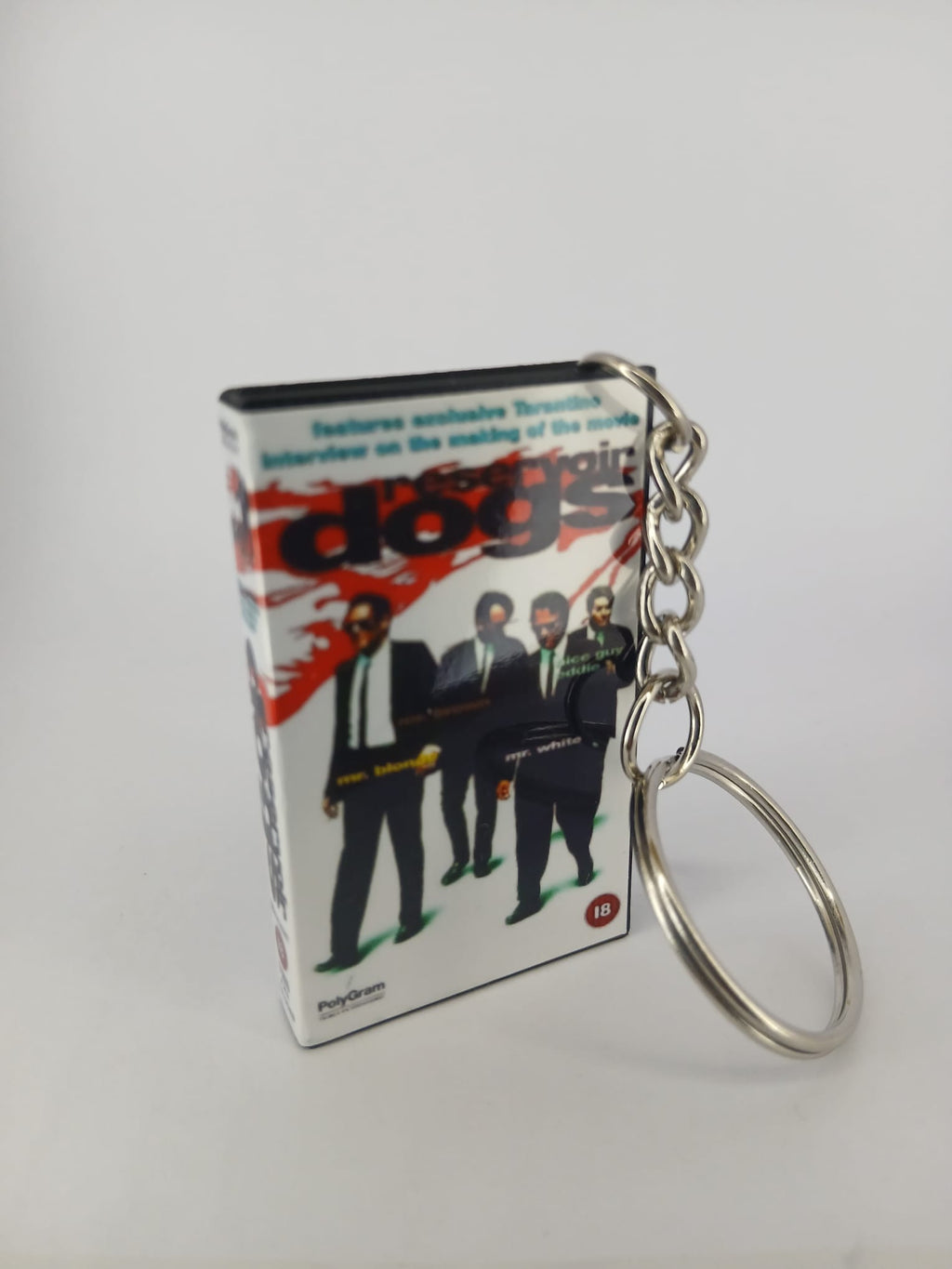 Reservoir Dogs VHS keyring — back and spine angled view standing