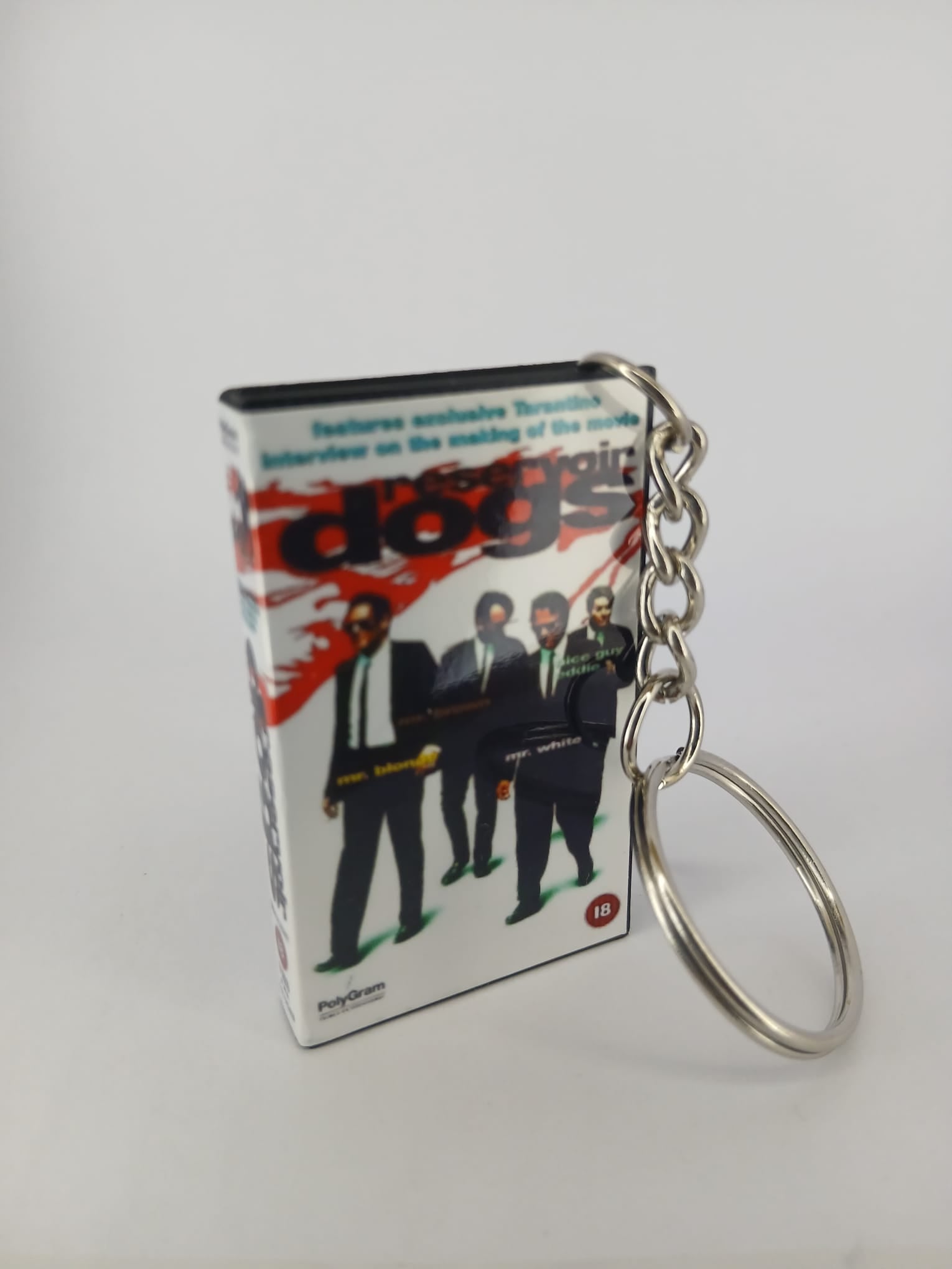 Reservoir Dogs VHS keyring — back and spine angled view standing