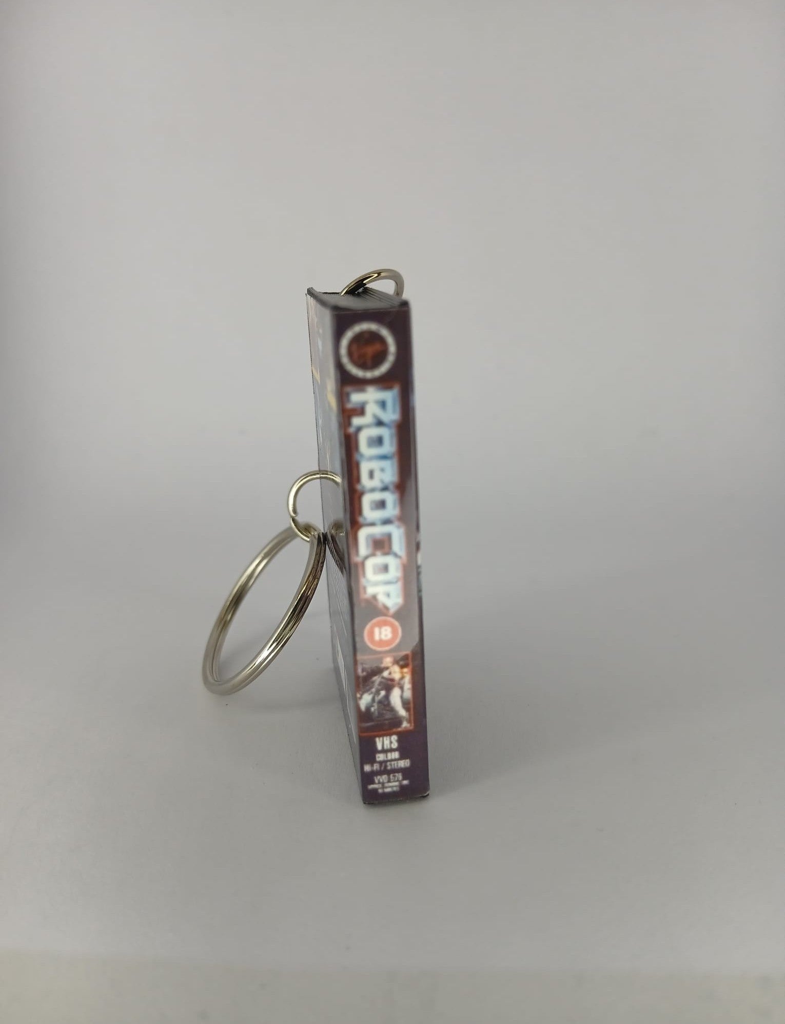 RoboCop Mini VHS Keyring – flat lay angle