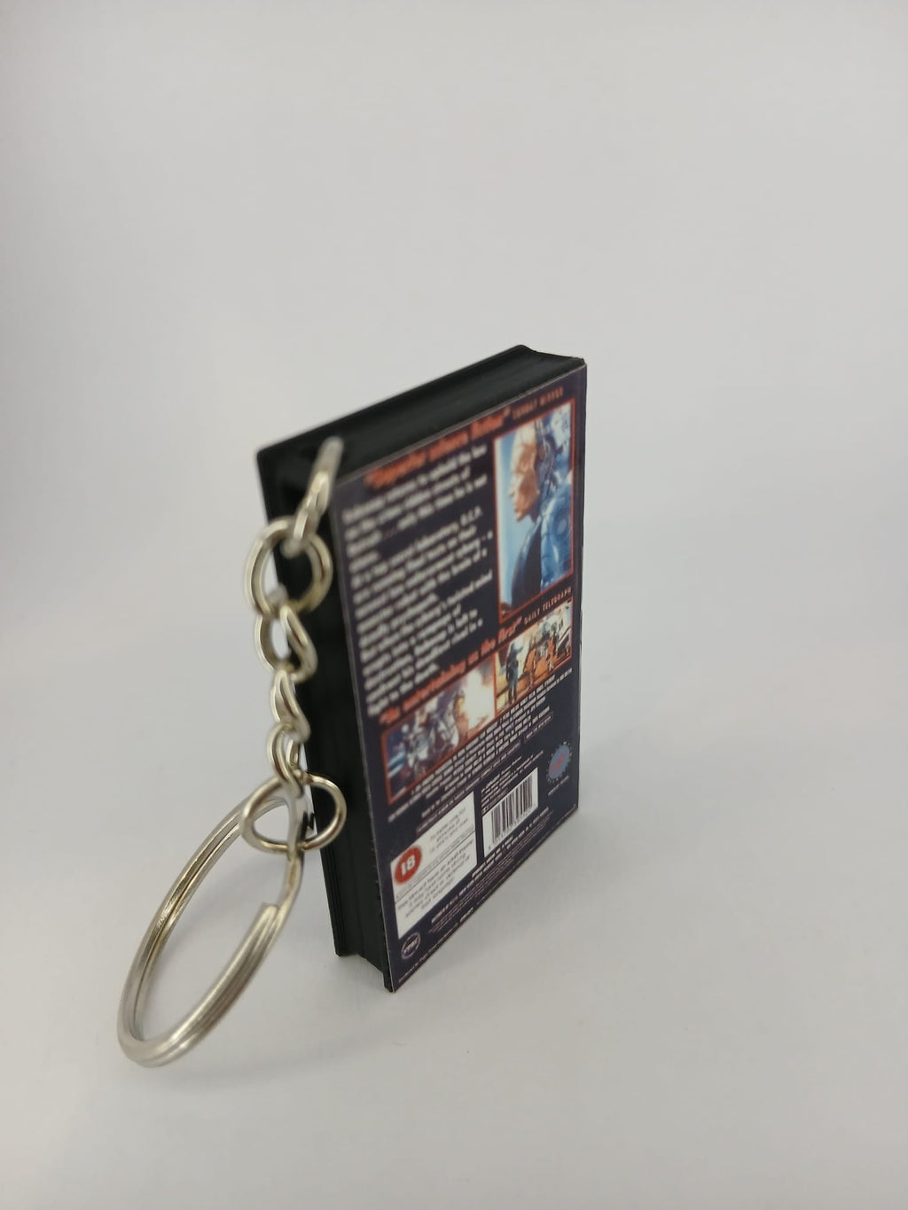 RoboCop 2 VHS keyring — back cover standing angled 2