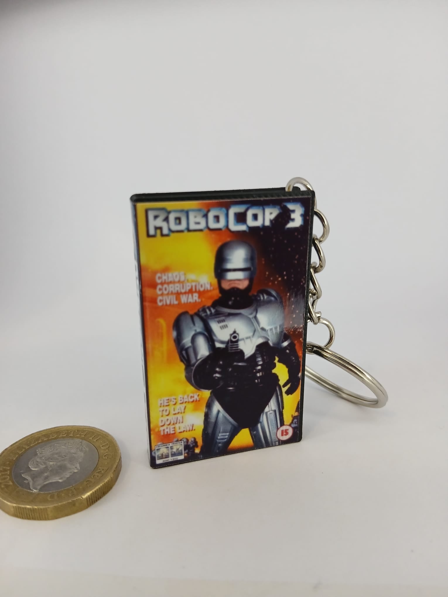 RoboCop 3 VHS keyring — back cover angled view standing