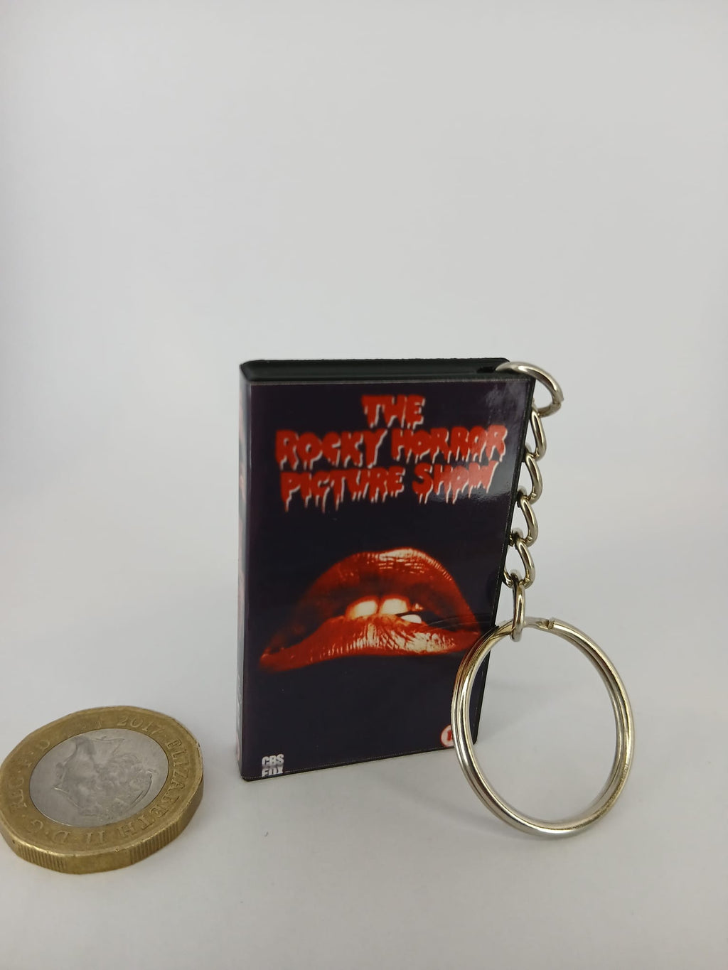 The Rocky Horror Picture Show VHS keyring — back cover standing angled 2