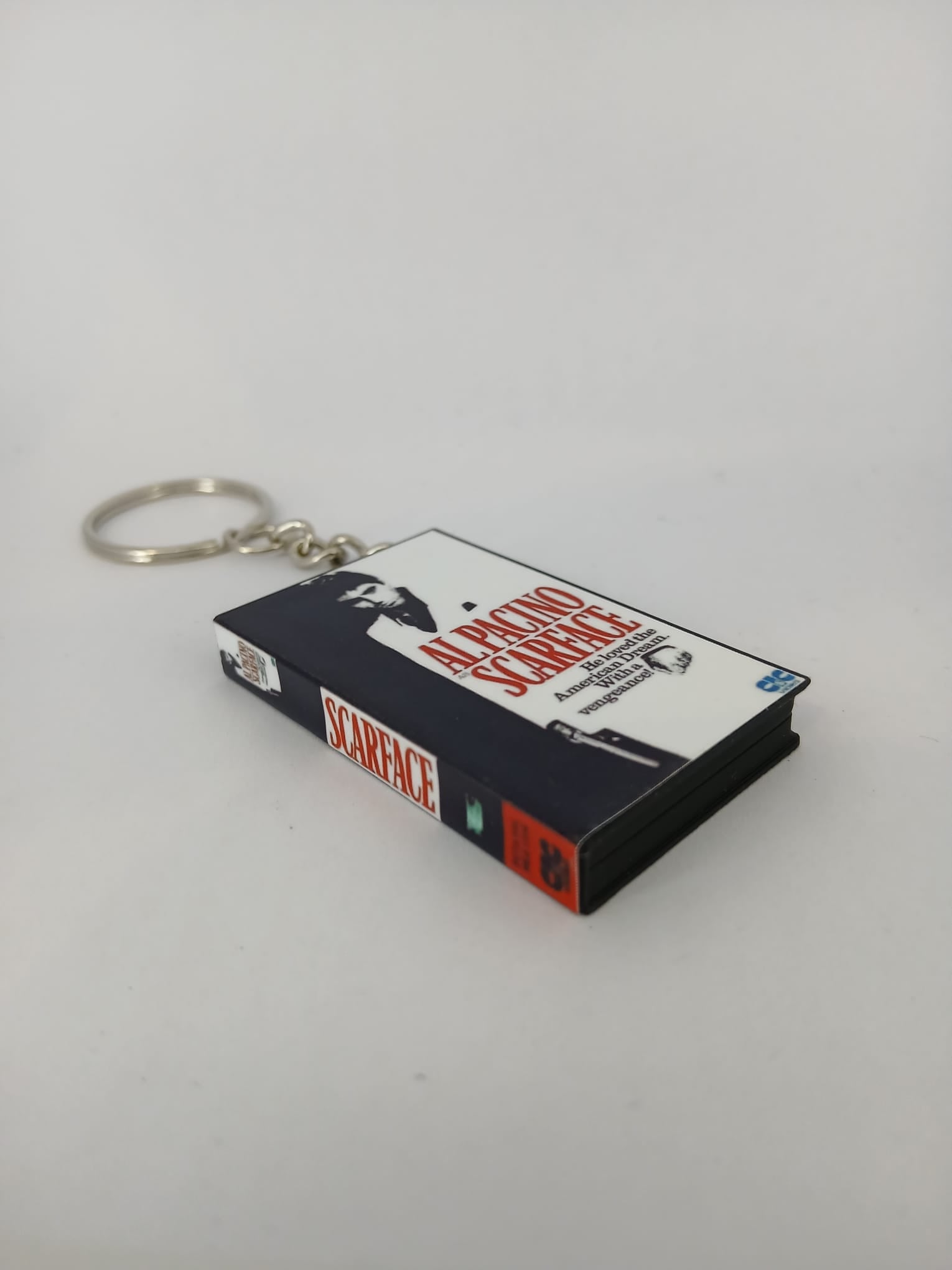 Scarface VHS keyring — front cover standing angled 2