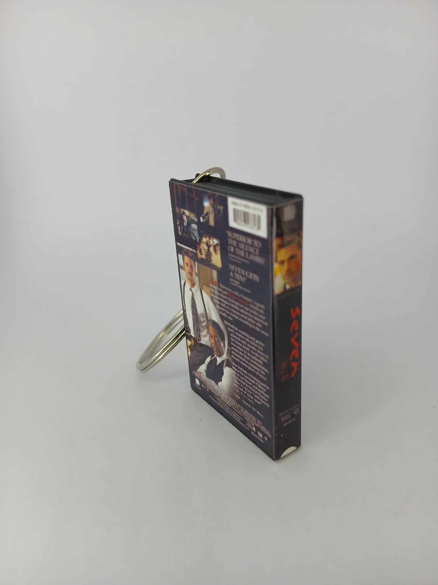 Se7en Mini VHS Keyring – flat lay angle