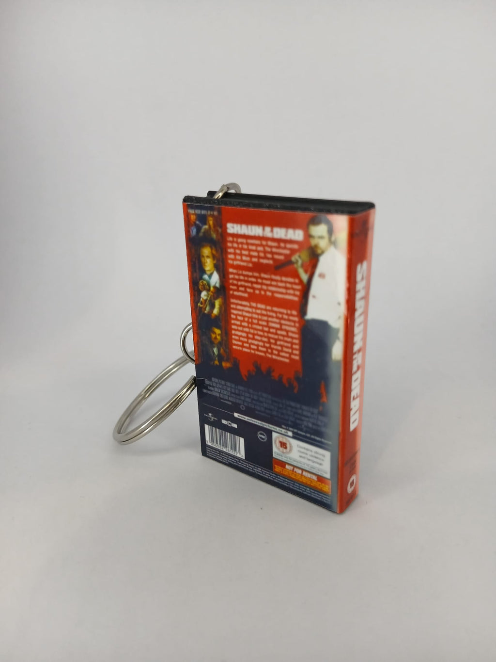 Shaun of the Dead VHS keyring — front cover standing angled