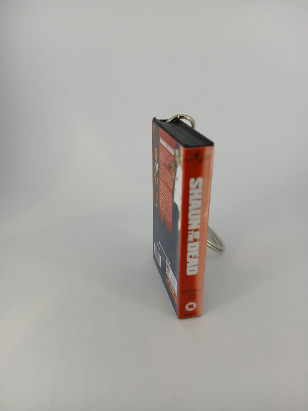 Shaun of the Dead VHS keyring — front cover standing angled 2