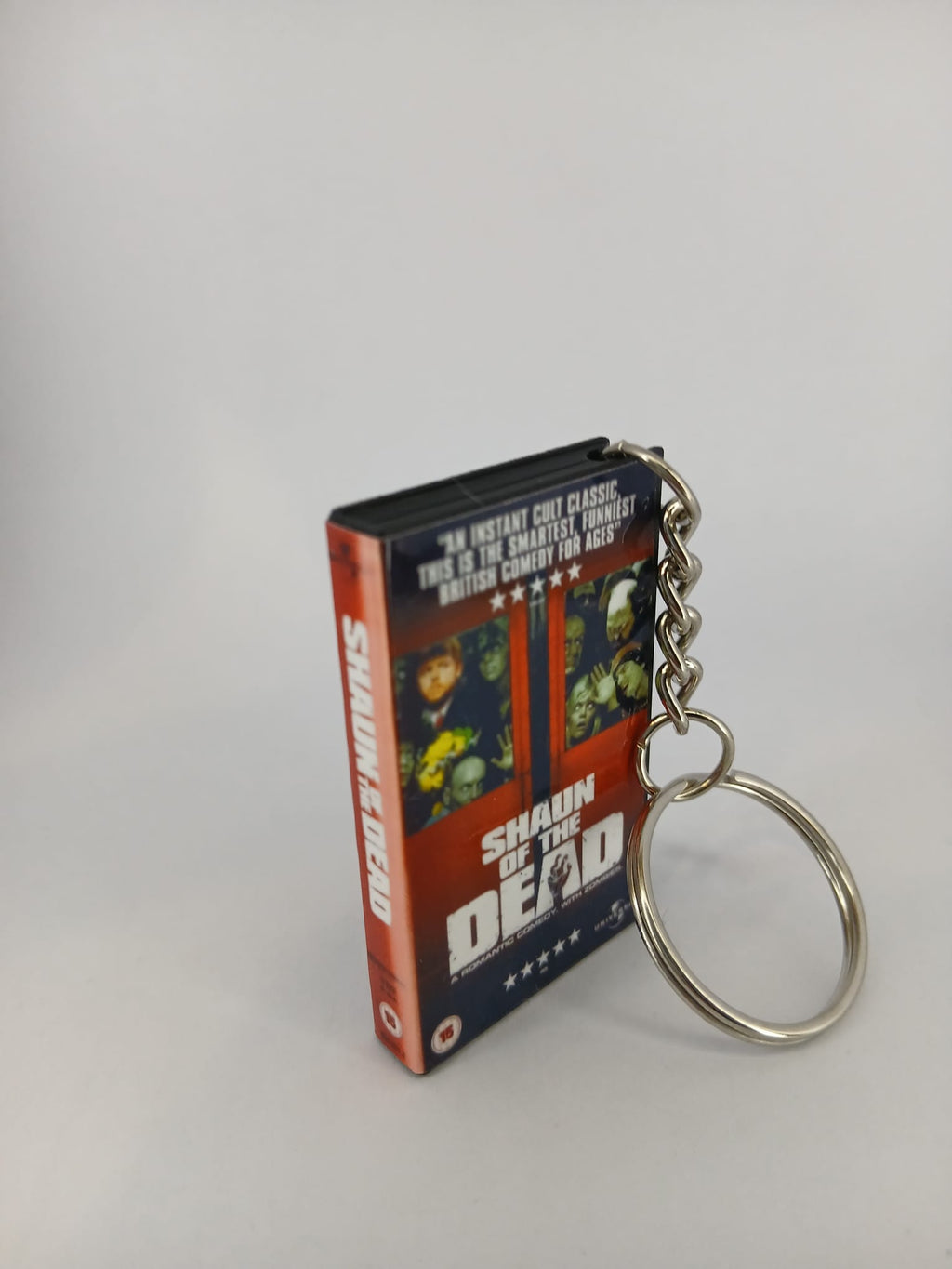 Shaun of the Dead VHS keyring — front and spine angled view standing
