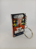Shaun of the Dead VHS keyring — front cover standing with coin for scale