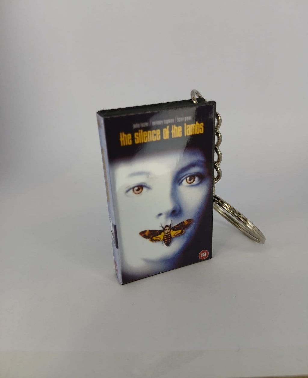 The Silence of the Lambs VHS keyring — front cover standing angled 2