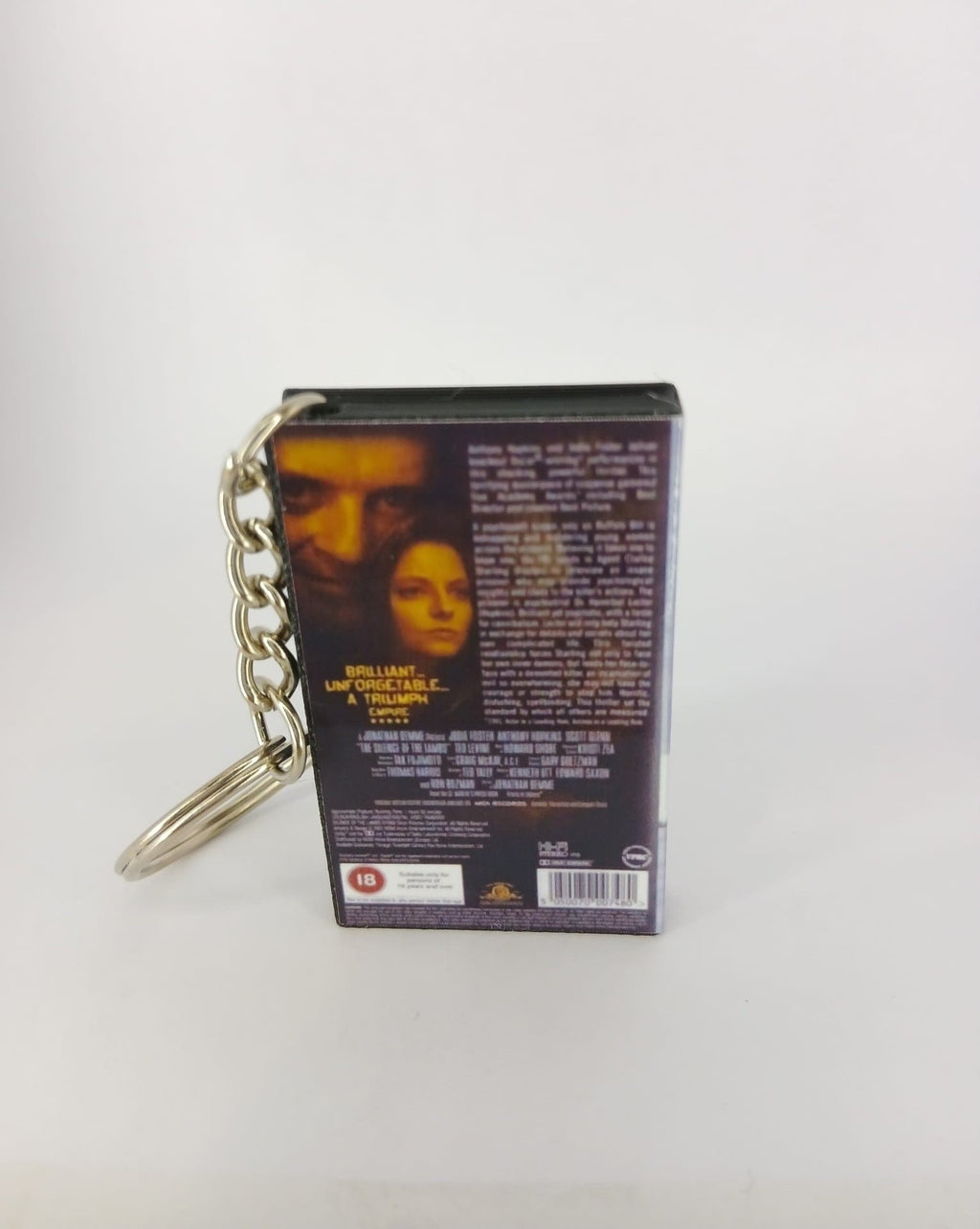 The Silence of the Lambs VHS keyring — front cover standing angled 3
