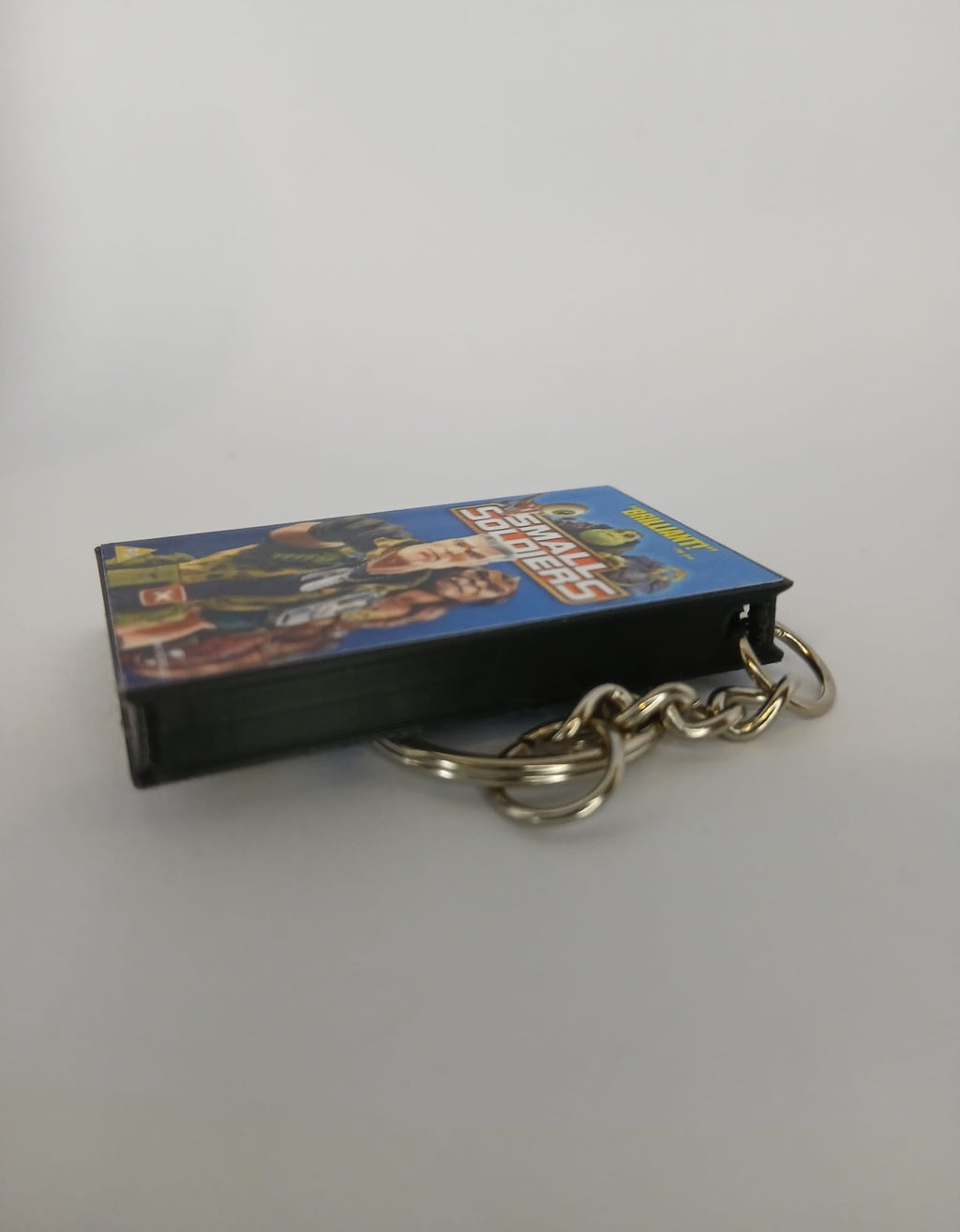 Small Soldiers VHS keyring — spine view standing
