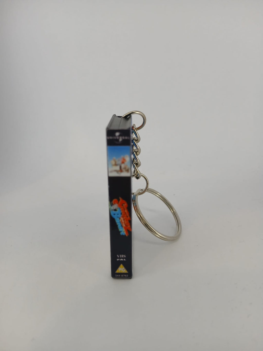Smokey and the Bandit VHS keyring — back cover angled view standing