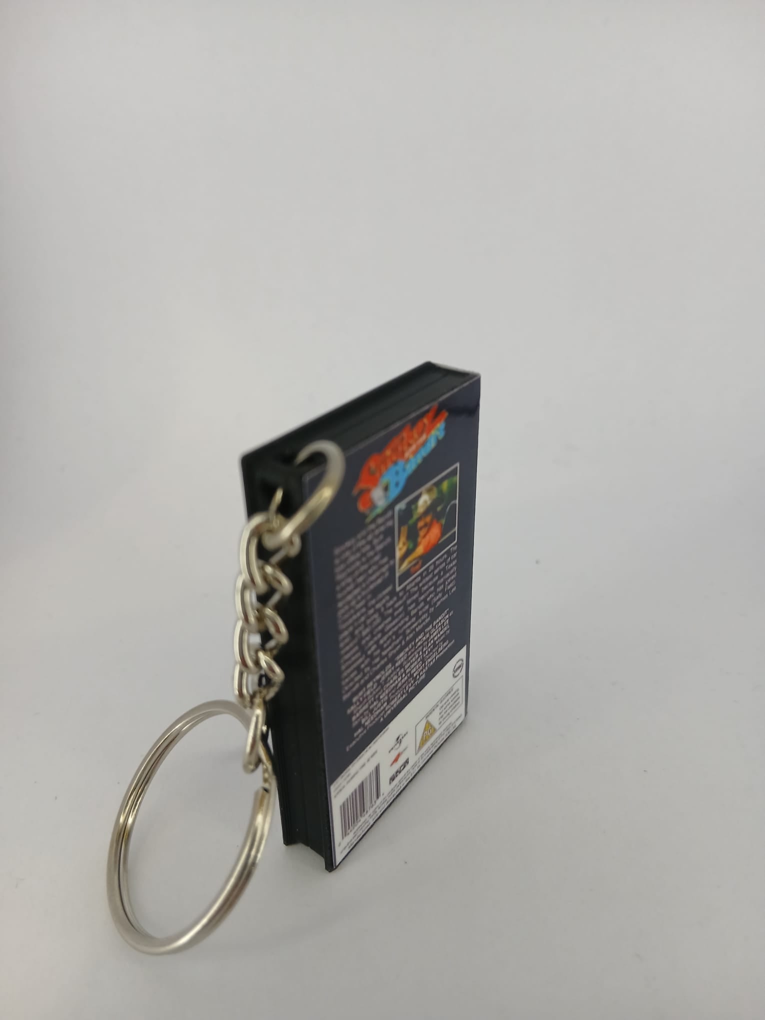 Smokey and the Bandit VHS keyring — back and spine angled view standing