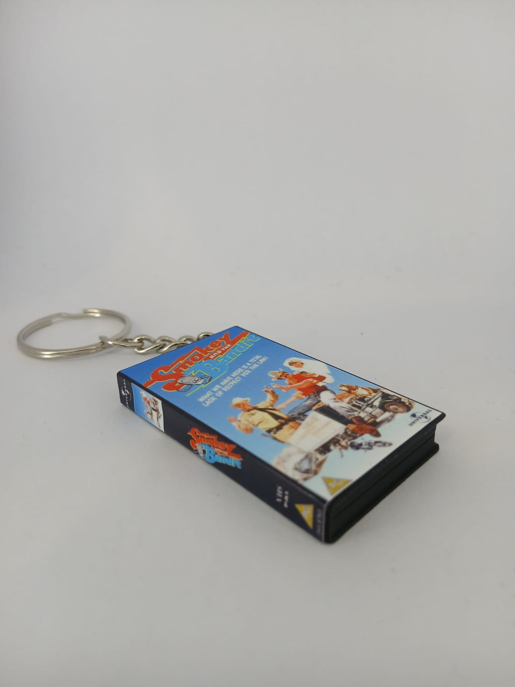 Smokey and the Bandit VHS keyring — front cover standing angled