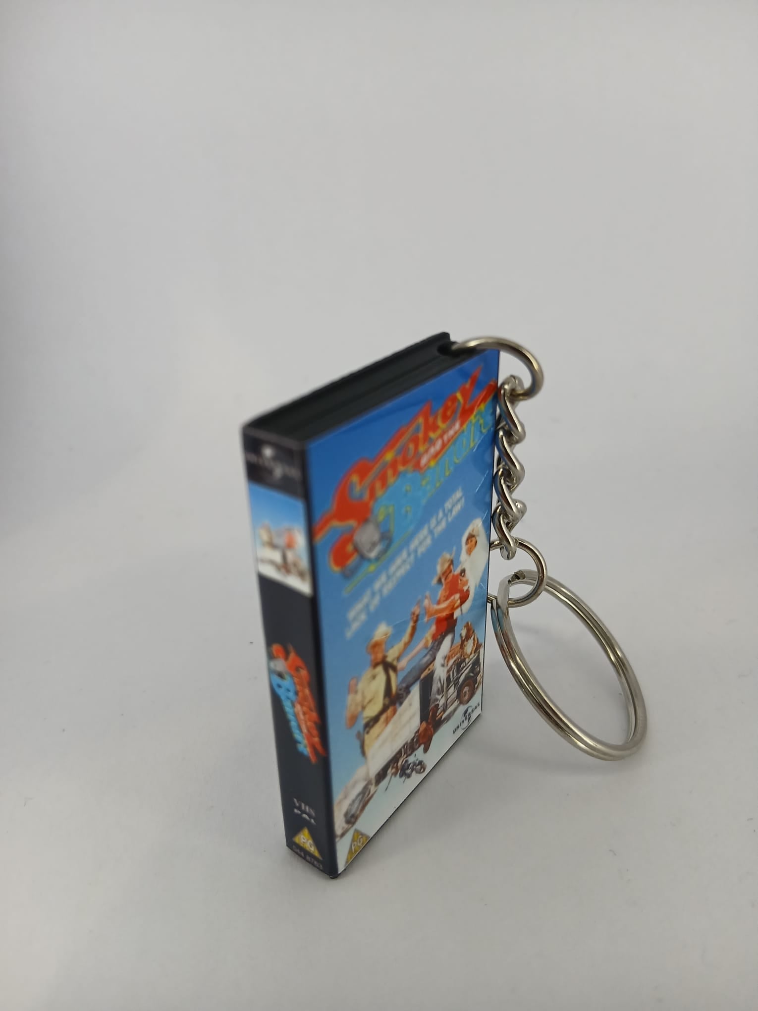 Smokey and the Bandit VHS keyring — front cover standing angled 2