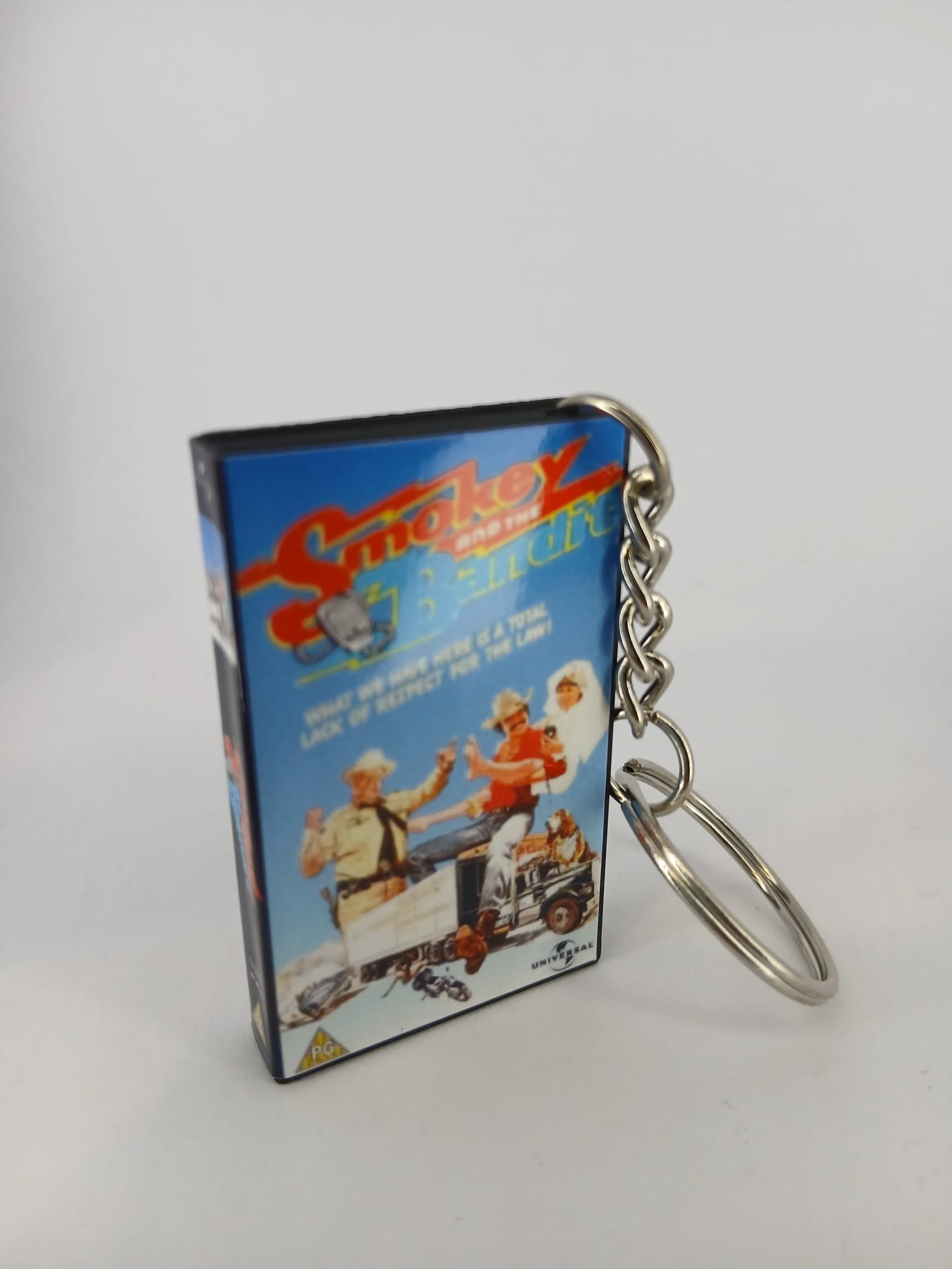 Smokey and the Bandit VHS keyring — front cover standing angled 3