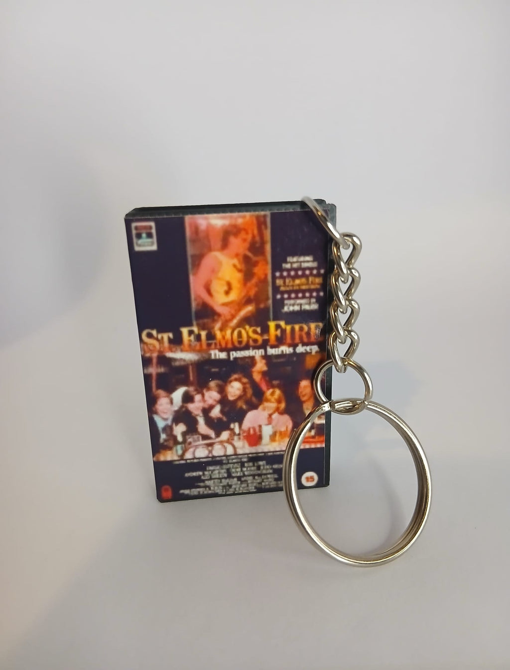 St. Elmo’s Fire Mini VHS Keyring – front view standing