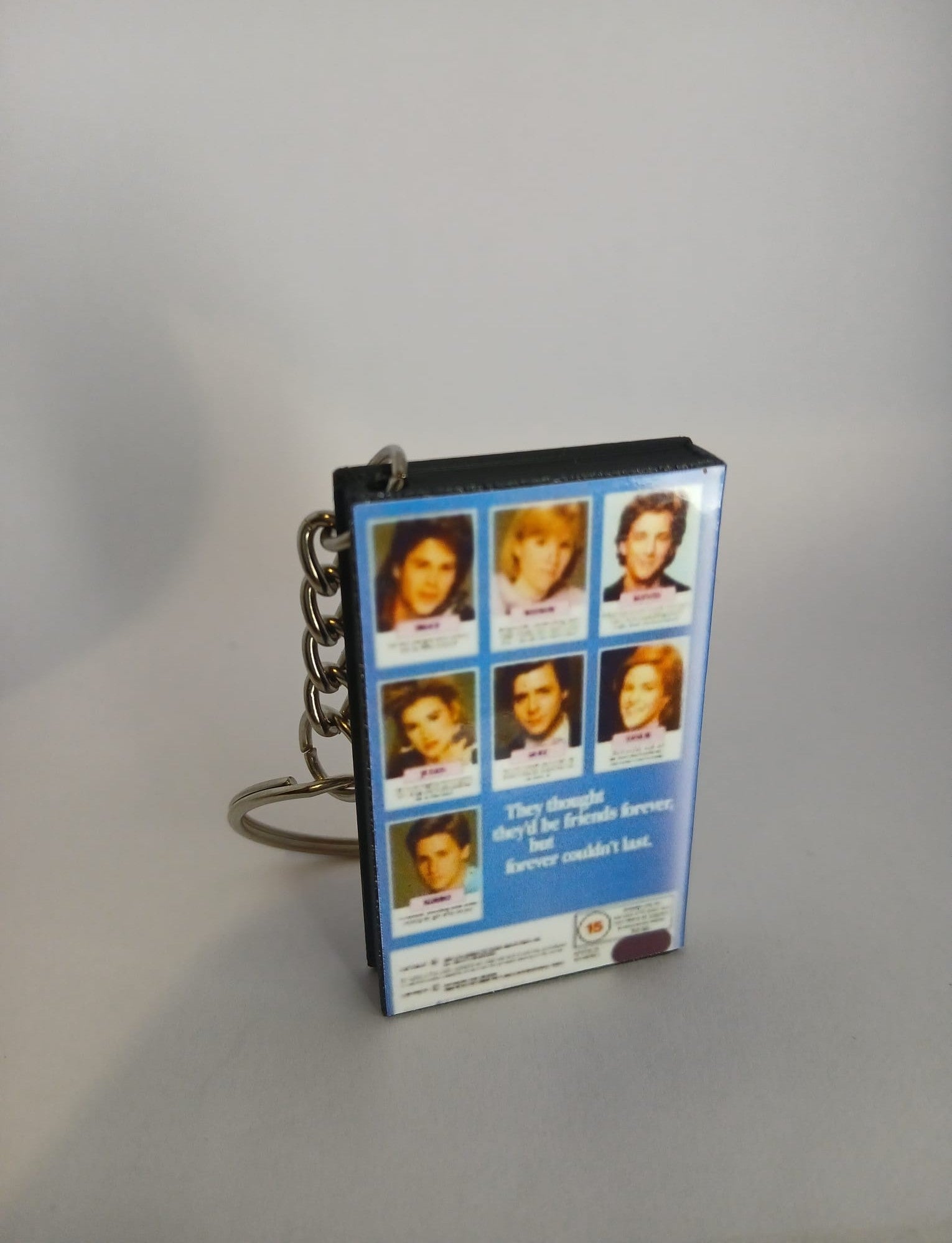 St. Elmo’s Fire Mini VHS Keyring – front angle standing