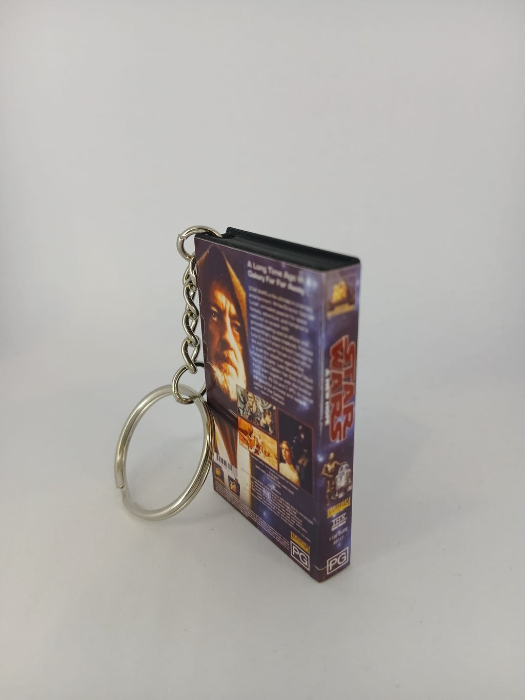 Star Wars A New Hope VHS keyring — front cover flat lay angled