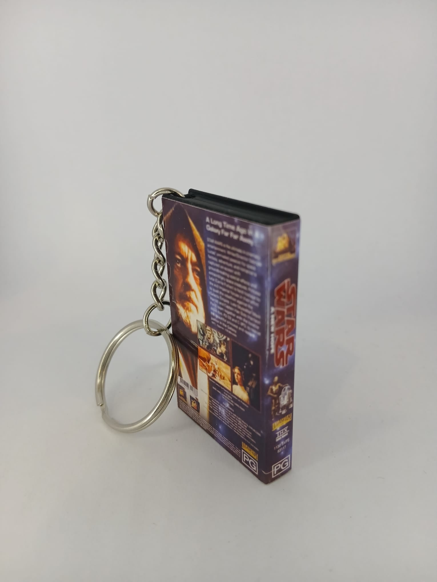 Star Wars A New Hope VHS keyring — front cover flat lay angled