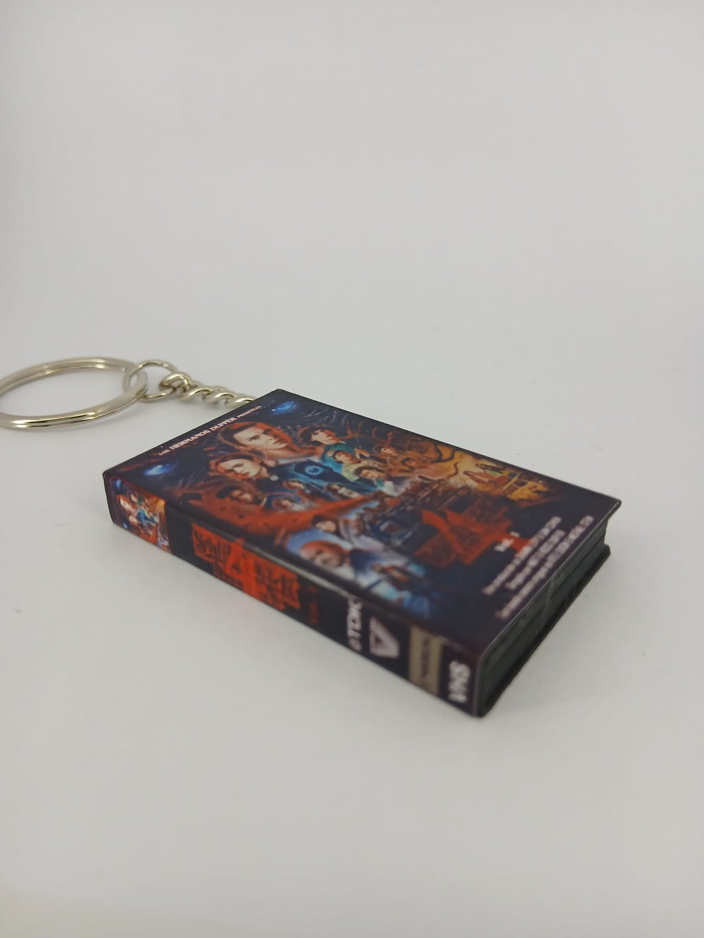 Stranger Things S4 Vol.1 VHS keyring — back cover standing angled 2
