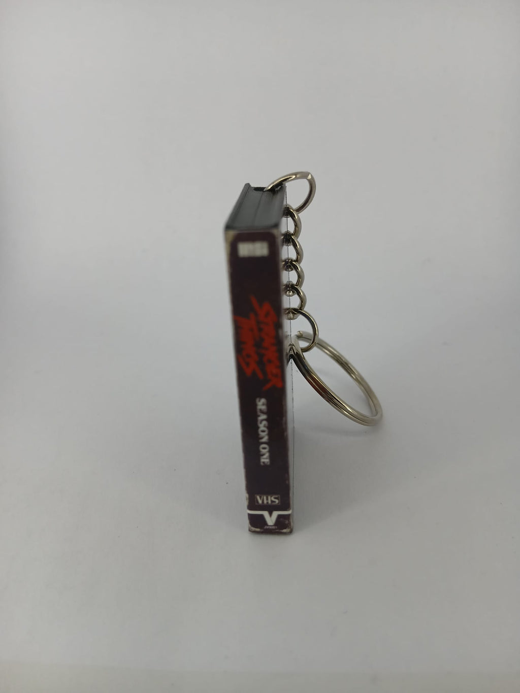 Stranger Things Season One Mini VHS Keyring – front with coin