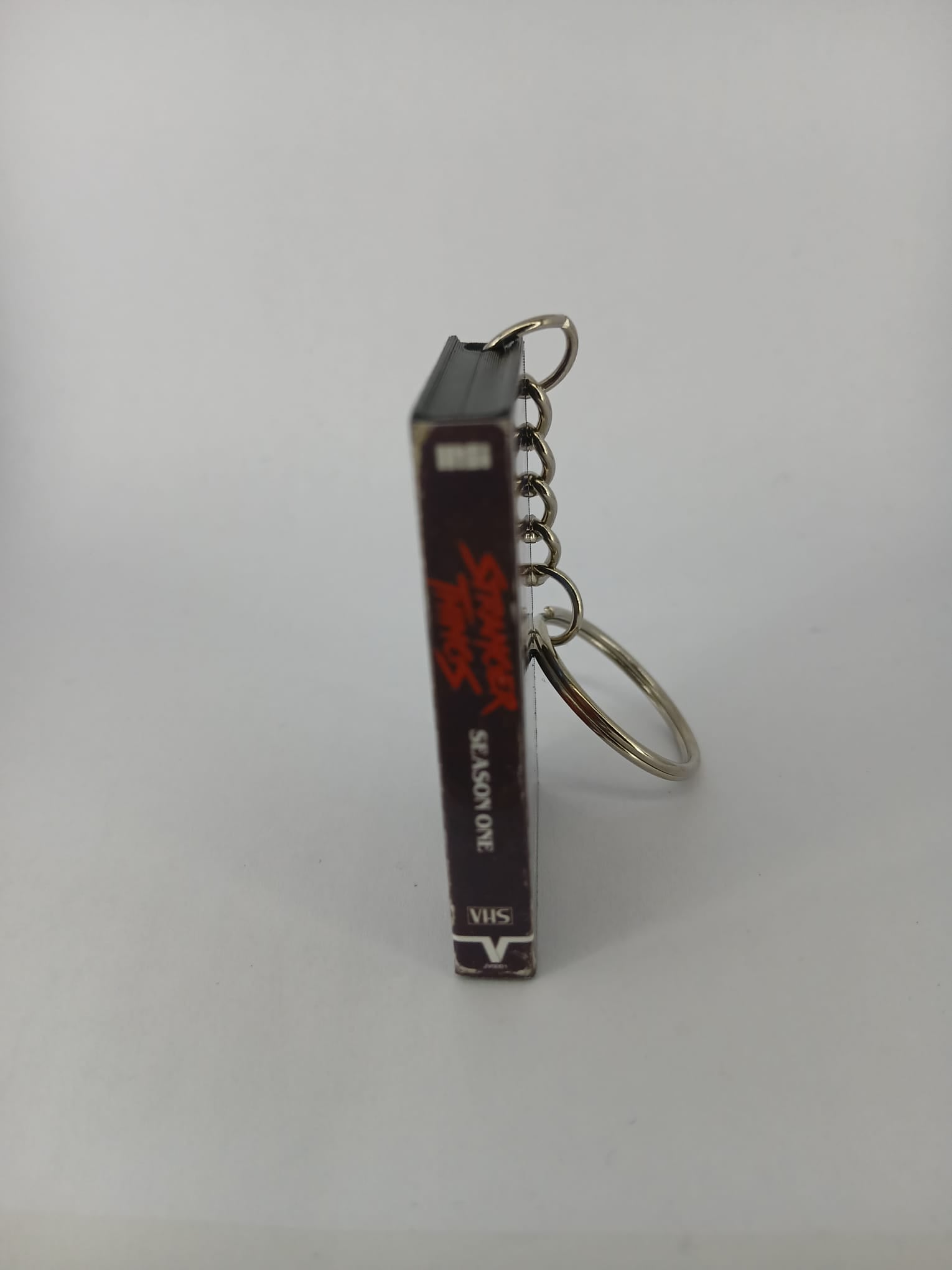 Stranger Things Season One Mini VHS Keyring – front with coin