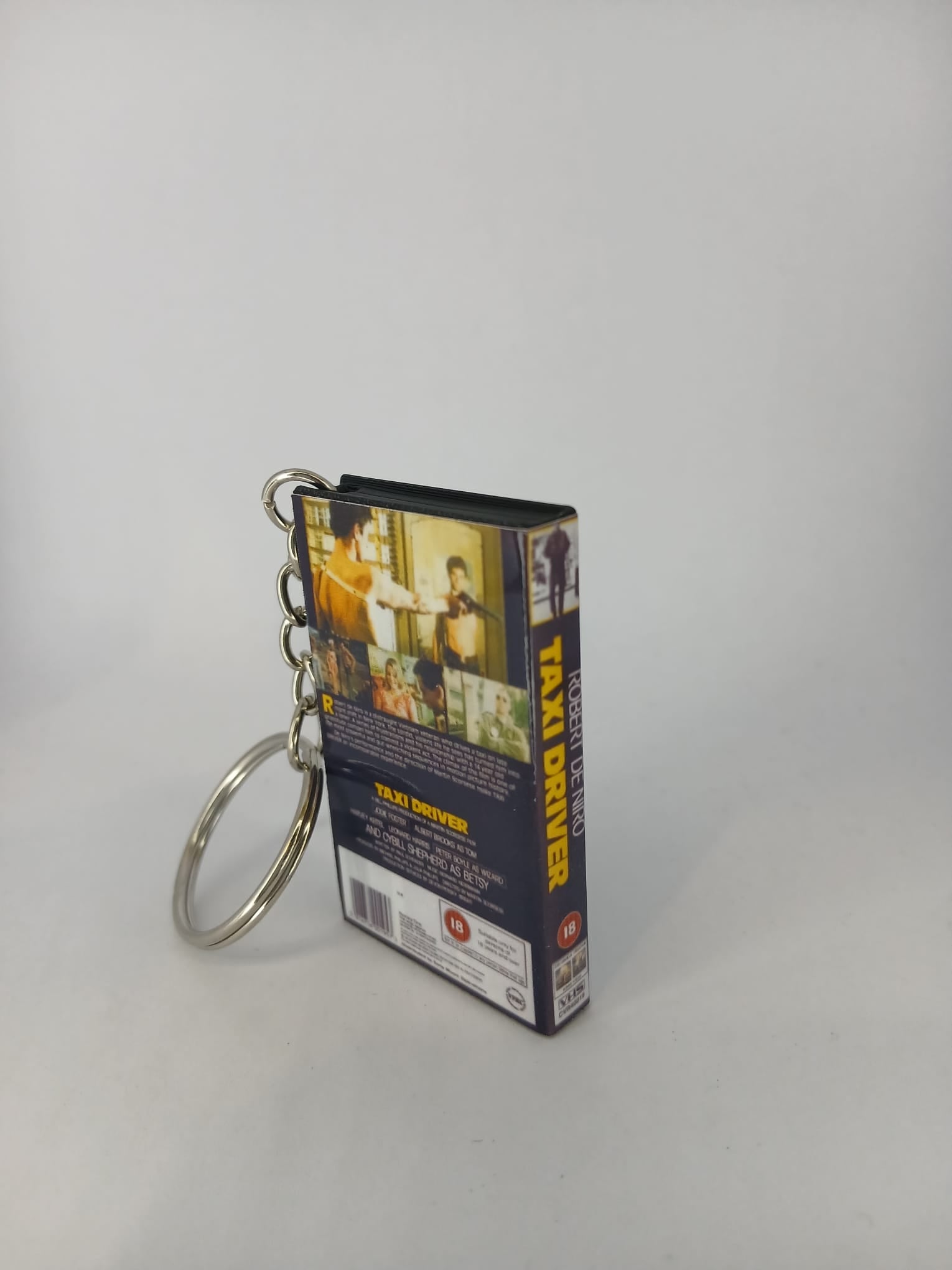 Taxi Driver VHS keyring — back cover standing