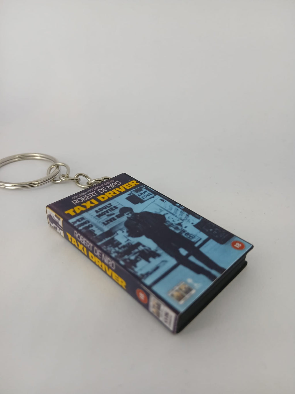 Taxi Driver VHS keyring — spine view