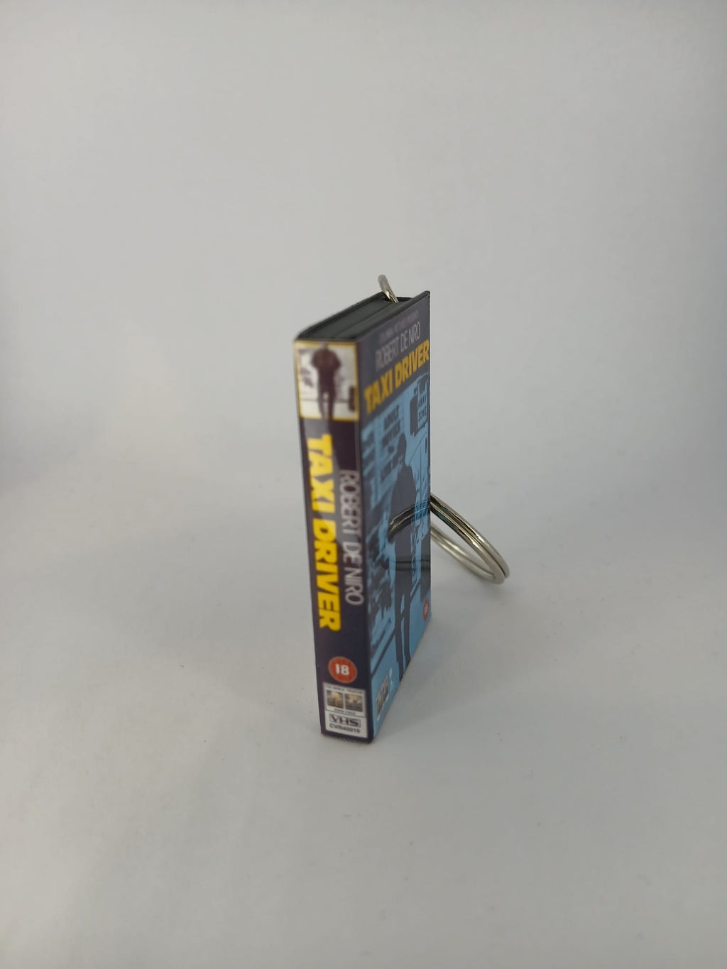 Taxi Driver VHS keyring — front and spine angled view